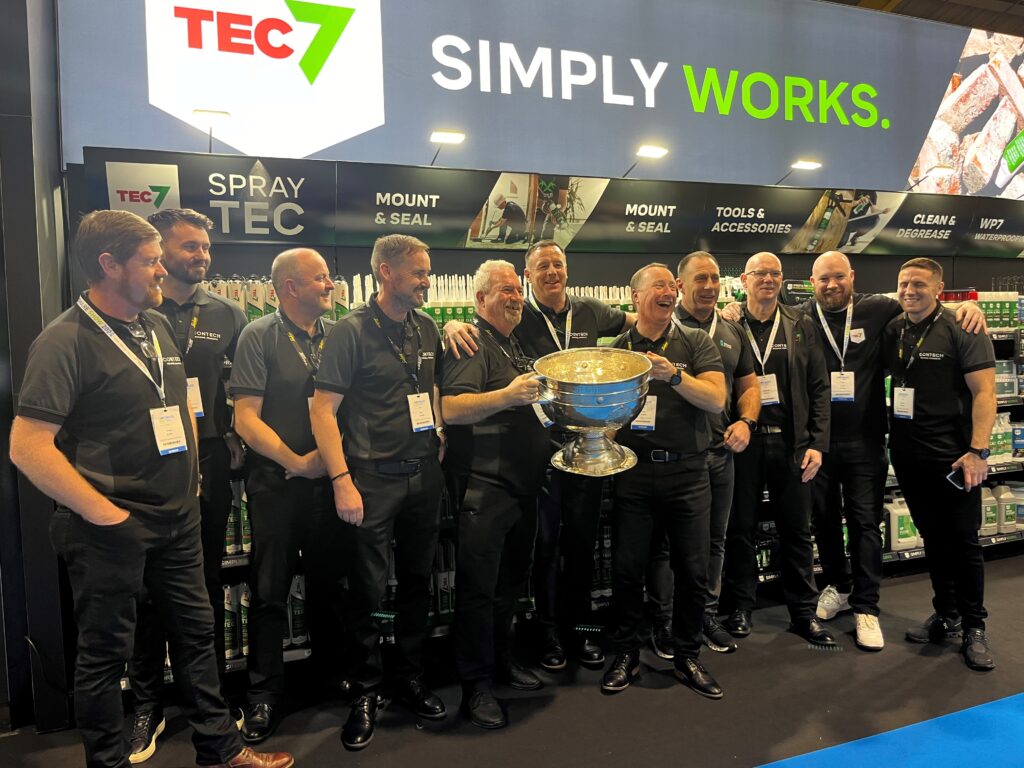 The Contech team holding the Sam Maguire trophy at the Hardware Show 2024